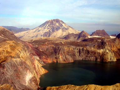 Mount Griggs seen over Mount Katmai's color-held crater lake