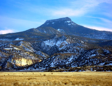 Cerro Pedernal's classic profile seen from New Mexico 96 to the northeast